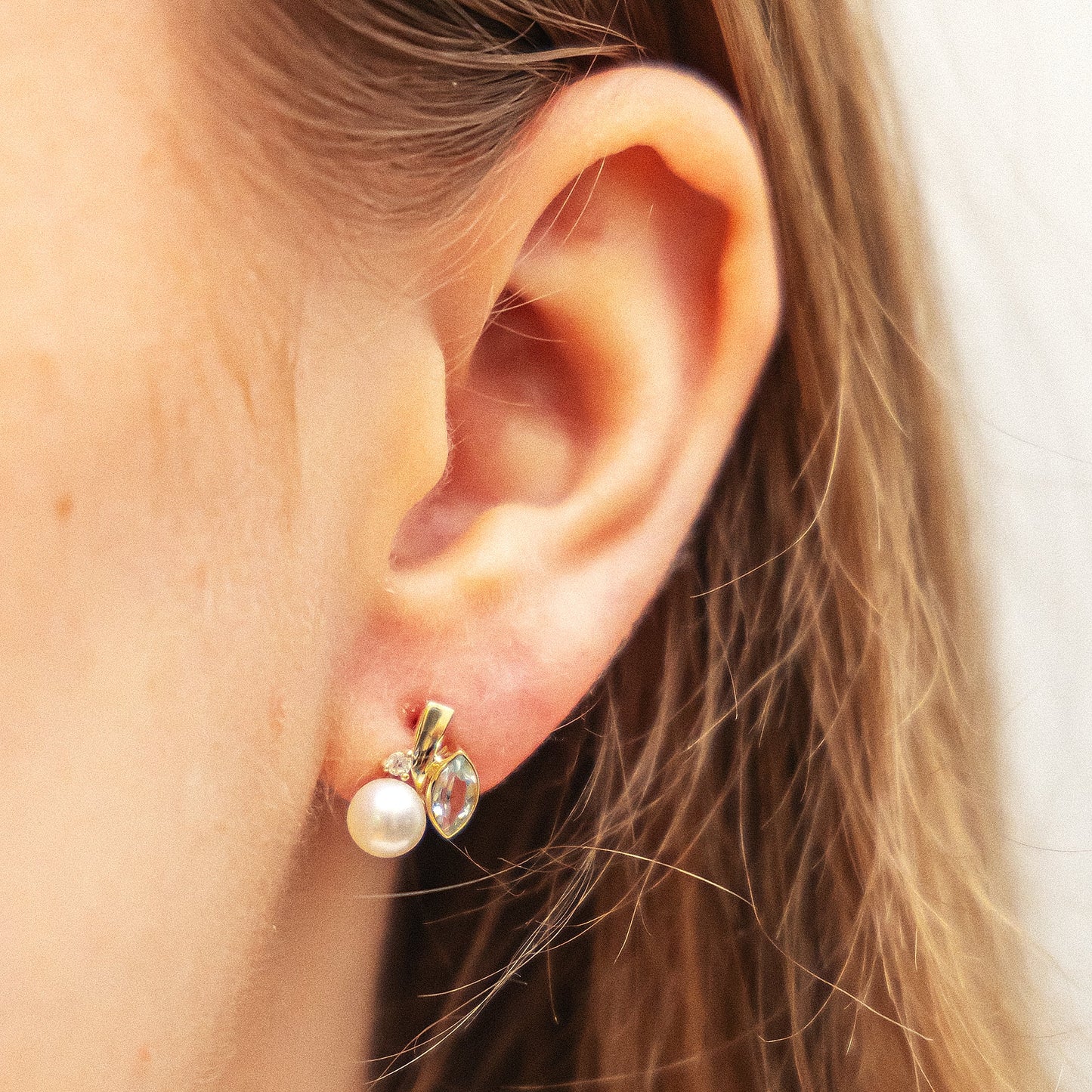 Ohrringe 375/- Gold 1,3cm Blautopas beh.