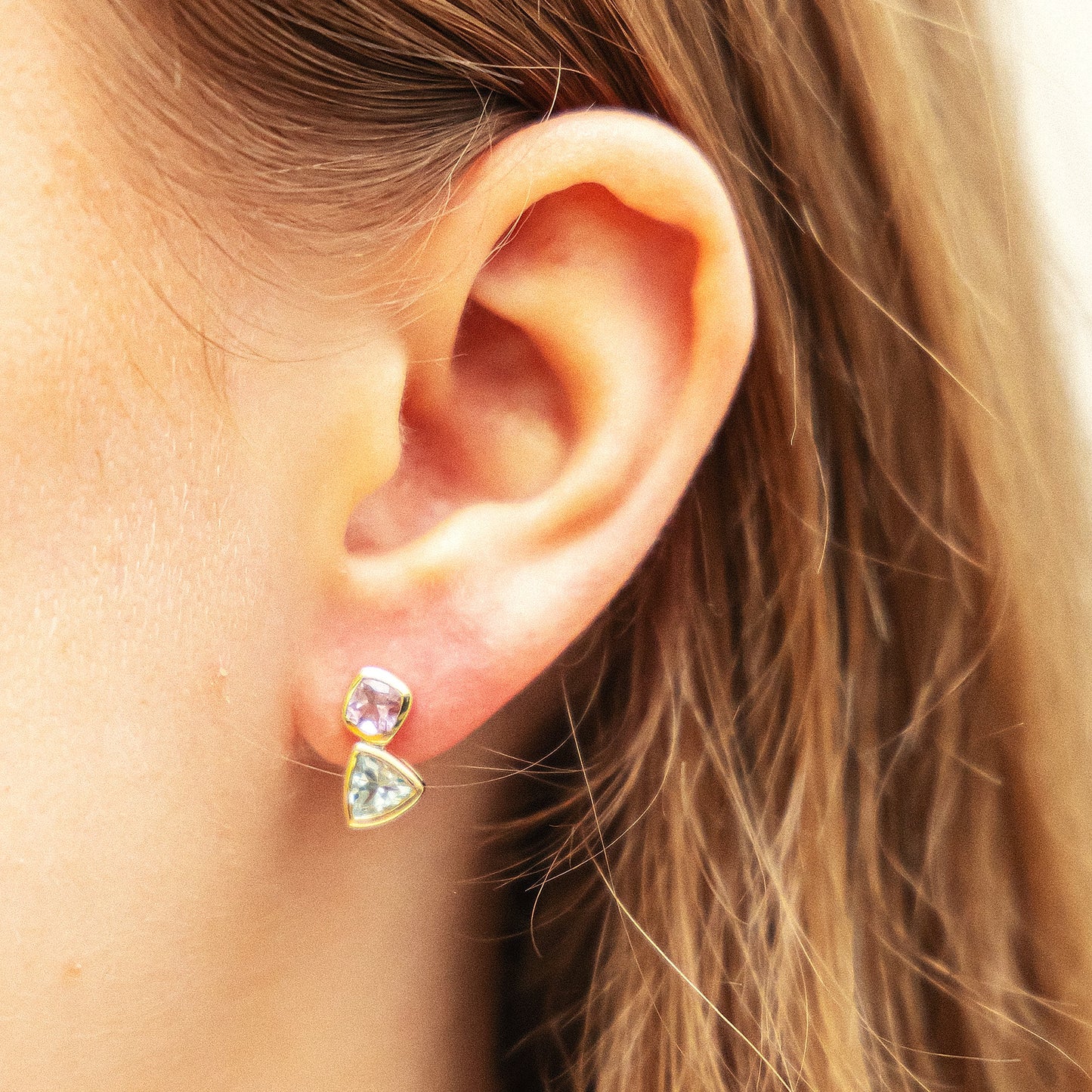 Ohrringe 375/- Gold 1,3cm Blautopas beh.