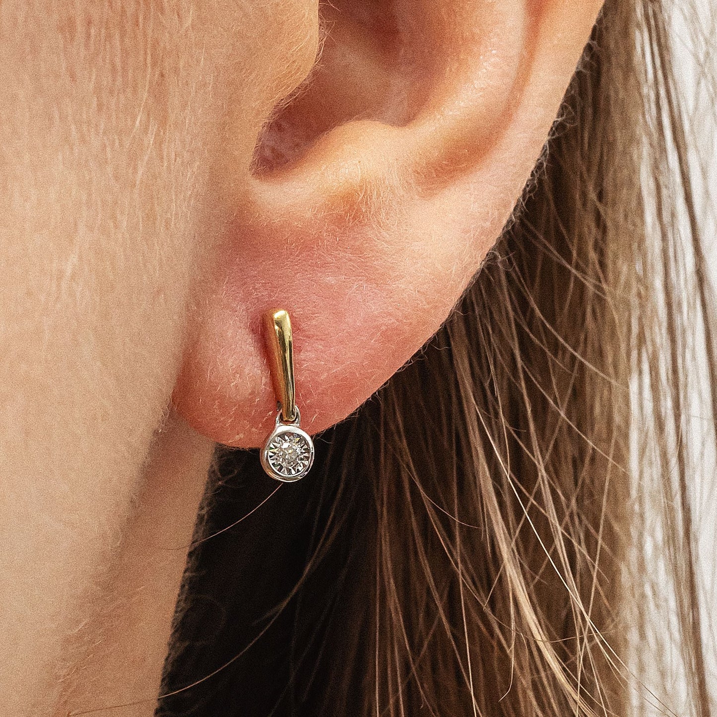 Ohrstecker 375/- Gold rhodiniert (teil) 1,2cm Brillant 0,03ct.